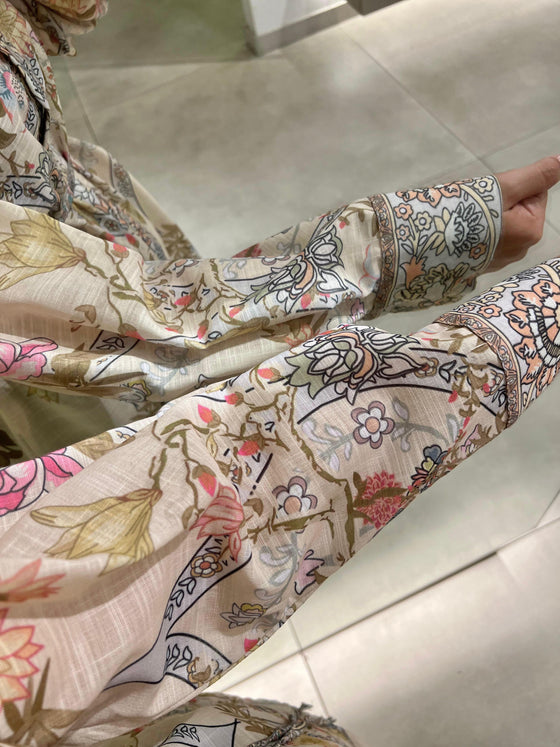 beige printed floral shirt
