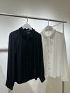 Black shirt with pearl