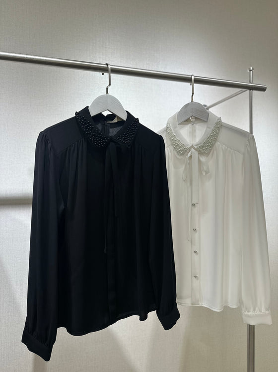Black shirt with pearl