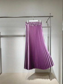  Purple pleated shiny skirt