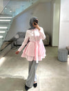 pink pleated shirt