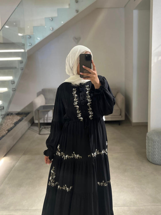 Embroidered black dress